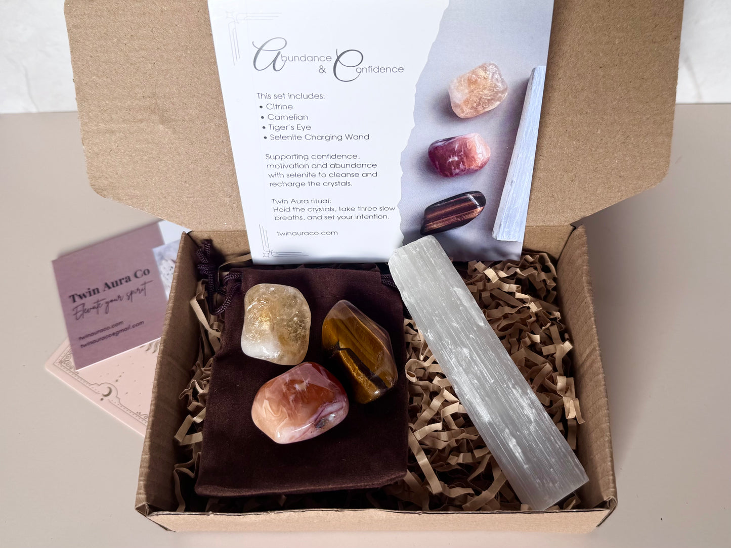 Crystal gift set with Citrine, Carnelian and Tiger's eye. With Selenite wand. Brown Velvet crystal bag and ritual card. 